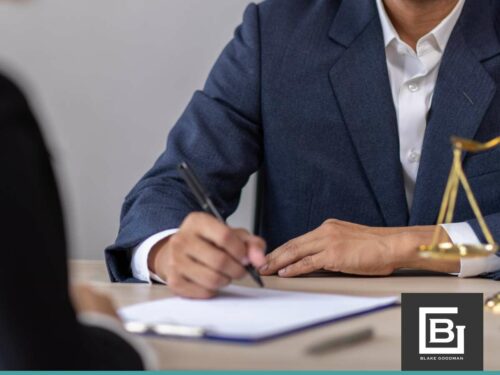 Attorney reviews documents with a client, highlighting implications of IRS Collection Expiration (CSED) on legal decisions.