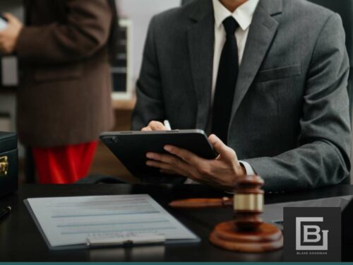 Attorney reviewing legal documents on how Chapter 7 Bankruptcy can stop creditors