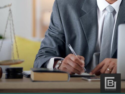 Lawyer reviewing Student Loans In Chapter 13 bankruptcy documents at desk