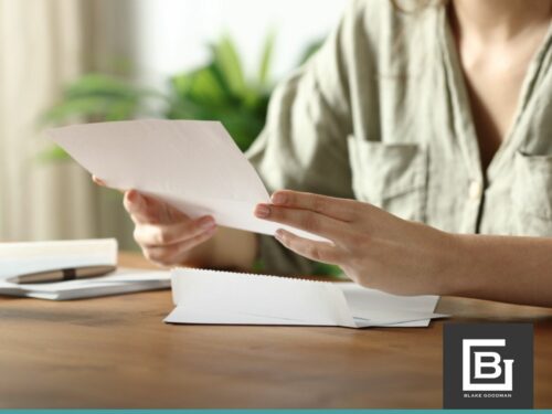 Person reviewing bankruptcy paperwork, illustrating Filing Bankruptcy protection in Honolulu